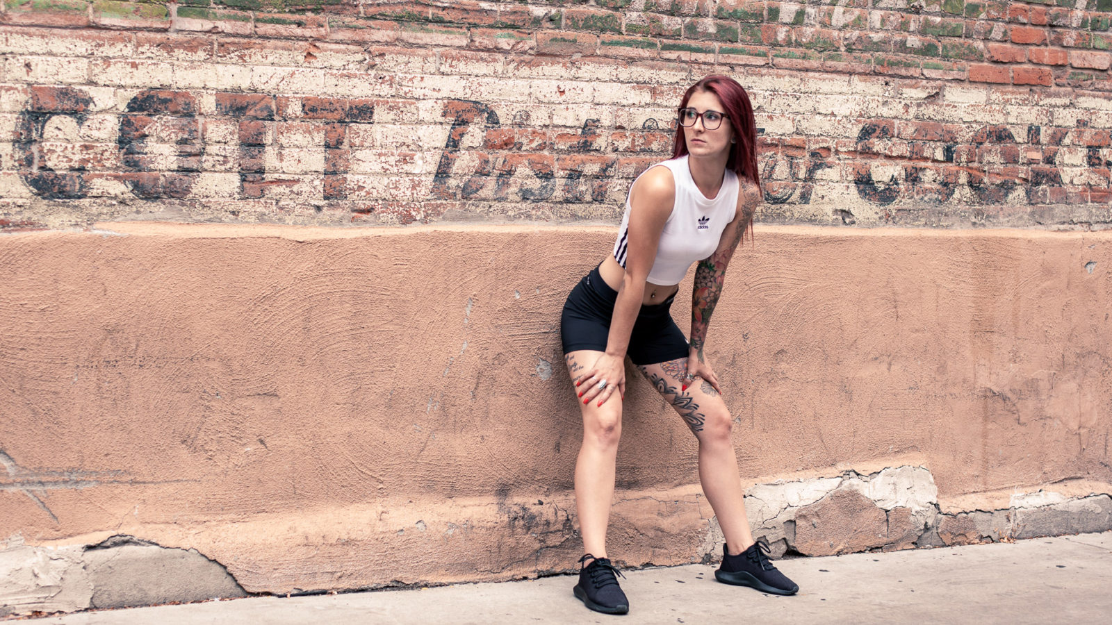 Clara Model Leans Against Wall In Denver Alley